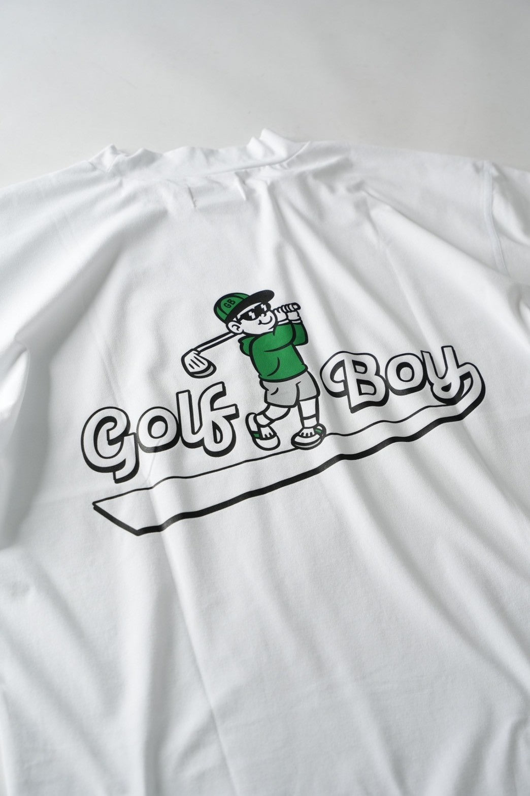 1.GOLF BOY back print mock neck-white